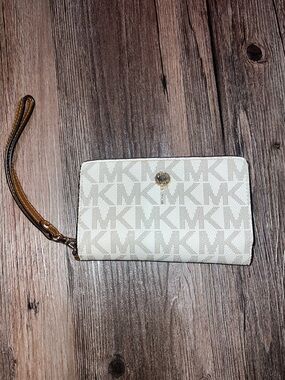Michael Kors Cream Signature MK Wristlet with Tan Strap